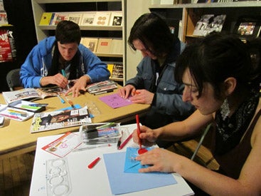 group of people making spirograph art
